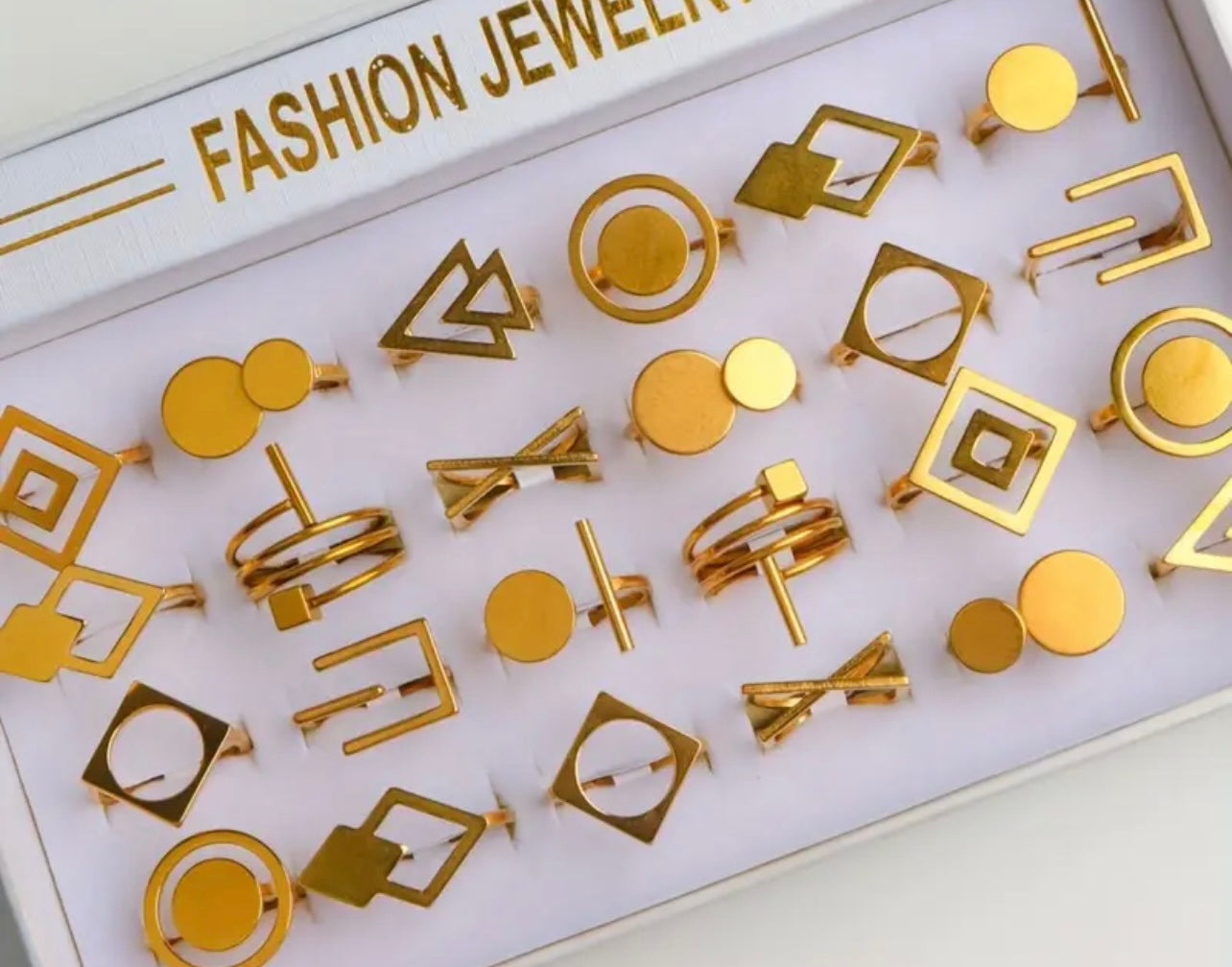 2 random stainless steel gold rings