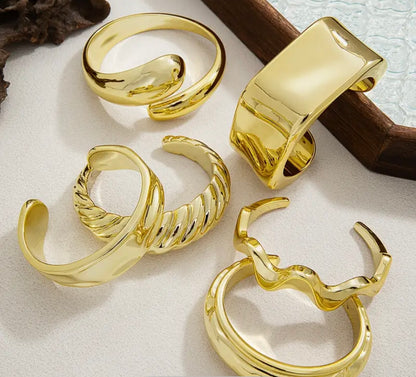2 random gold bangles