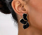 Flower shaped black and gold earrings