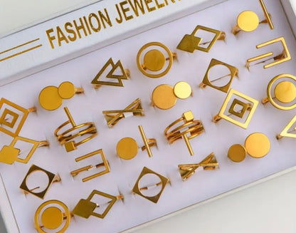 2 random stainless steel gold rings