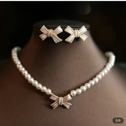 Elegant pearl necklace and earrings