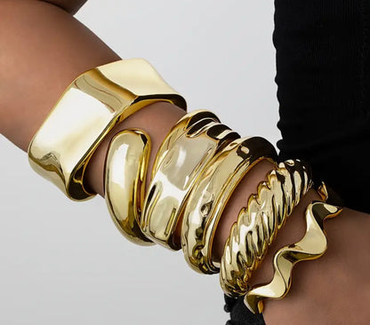 2 random gold bangles